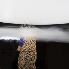Enveloping atmospheres - experiment with structural textiles (knitted willow column)